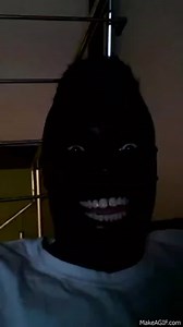 Black Man Laughing in the Dark on Make a GIF
