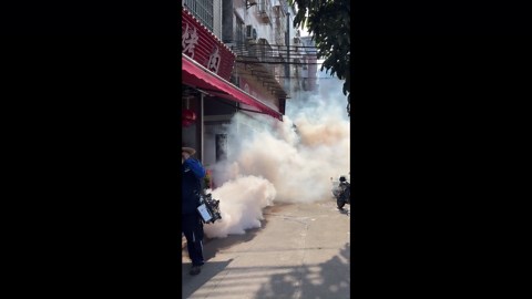Mosquito fogging in street to prevent chikungunya fever in Guangdong, China