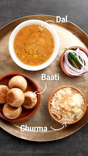 Santusht' is what you will feel after savouring my simple and delicious recipe of the traditional 'Dal Baati Churma' 😋 Ingredients Baatis 2 cups whole wheat flour (atta) ½ cup semolina Salt to taste ½ cup ghee Melted ghee as required Churma 2 cups whole wheat flour (atta) 4 tbsps semolina ½ cup pure ghee to deep fry to serve 1 cup milk ¾ cup powdered sugar ¼ tsp green cardamom powder 10 cashewnuts, chopped 10 almonds, chopped 10 raisins Dal 2 cups cooked split red lentils (masoor dal) 2-3 tbsps