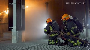 Fighting live fires and training for different scenarios are part of what SCDF NSFs go through before being deployed as first responders. A look at their various drills: https://str.sg/wFGn | The Straits Times