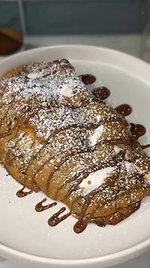 Flaky pastry filled with s'mores ingredients and chocolate chips
