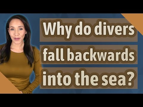 Why do divers fall backwards into the sea?