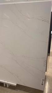 Splendor by Viatera is the essence of sophisticated elegance! Highly detailed golden veins sweep diagonally across a soft white base evoking the look of marble without the hassle. Stop by our Guelph showroom to view this statement piece. #quartz #countertops #renovation #interiordesign #engineeredquartz #kitchen #kitchendesigns #whitekitchen #island | KW Countertop