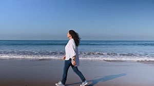 Rear View Young Happy Woman Blue Stock Footage Video (100% Royalty-free) 1111770437 | Shutterstock