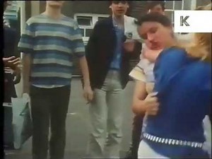 1980s London high school, two girls fight in the playground