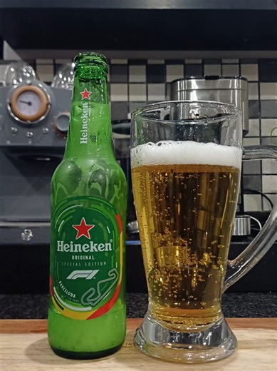 Enjoying a Cold Heineken Beer After Work