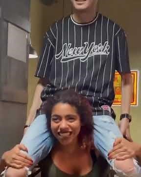 woman power lift carry man