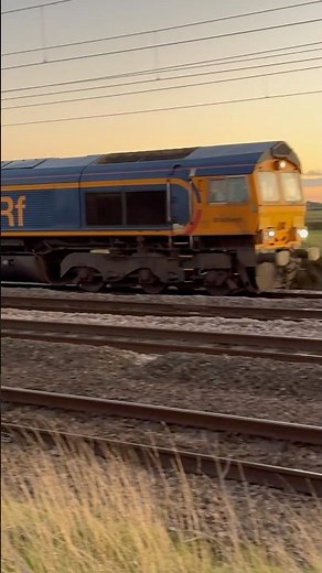 Class 66 “Cambridge PSB” Freight Train Hauling Through York at Sunset | GBRf 66733