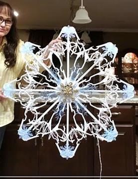 DIY Hangers Snowflake Instructions on How To make Christmas Décor, made from simple plastic hangers.