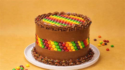 Chocolate cake with colorful candy layers