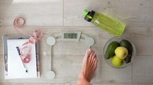 Premium stock video - Skinny girl's lean legs showing perfect weight, closeup