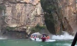 Brazil: Terrifying moment rock formation falls onto boats