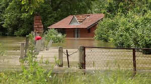 clip-6523271-heavy-floods-submerged-house-on-coast-rural