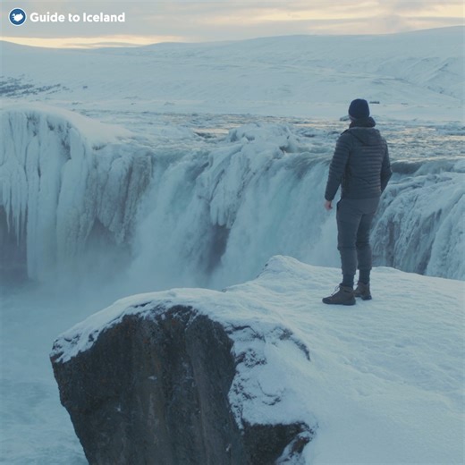 Goðafoss Waterfall in winter is pure magic ❄️✨ One of North Iceland’s most popular sights, it’s located right on Route 1 between Lake Mývatn and Akureyri 📍 A must-see on your winter Iceland adventure! 🏞️ | Guide to Iceland