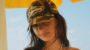 Emily Ratajkowski rocks the tiniest pink floral bikini ever on the beach