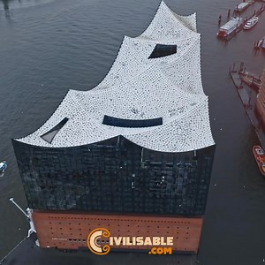 8.5K views · 647 reactions | Hamburg’s Architectural Gem The Elbphilharmonie stands as an iconic concert hall with a wave-like glass structure and impressive city views. Ready to experience its magic? #VisitHamburg #GermanArchitecture #ConcertHall | Germany Art & Architecture | Facebook