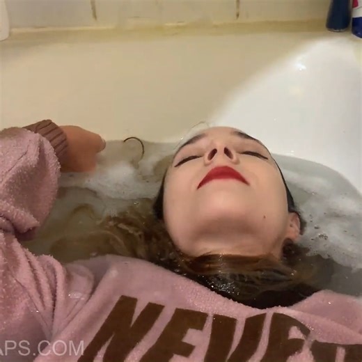 Get Your Snaps on Instagram: "Just Violet Violet returns with a warm and intimate indoor wetlook session — a soft, cozy, personal-style video that perfectly captures what makes her fan-favorite. She begins in a fluffy pink sweater, olive-green pants and white sneakers, slowly letting the water soak through layer by layer. The sweater fills and darkens beautifully under the stream, the pants turn glossy and cling tight, and the sneakers drip steadily as she moves between the bathtub and the showe