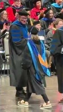 Doctoral Commencement / PhD Graduate School Graduation Ceremony University at Buffalo Crossing Stage