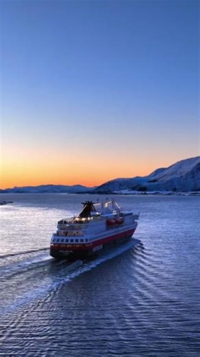 Sailing into golden hour 🌅 MS Polarlys sails south from Risøyhamn, Norway, bathed in the soft glow of the sun. Would you love to be on board right now? 🚢 🎥 @_daneil_photos #Hurtigruten #MSPolarlys #VisitNorway #Norway | Hurtigruten