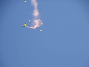 PHOTOS: Navy SEAL Leap Frogs Parachute into Puopolo Park