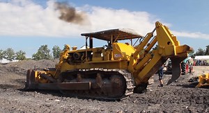 Caterpillar CAT D8. A very old beast starting their engine and push.