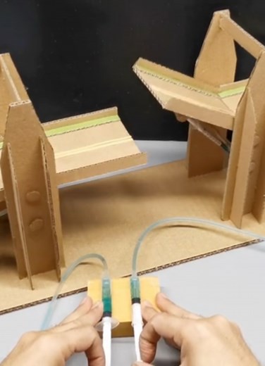 Building a Hydraulic Bridge for Grade 9 Students