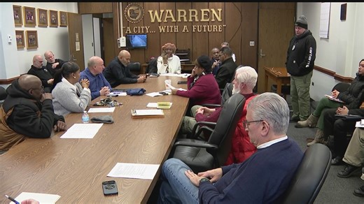 Warren meets compromise on dog warden position