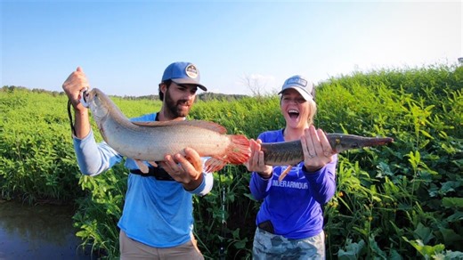 Hiking snake-infested terrain to catch prehistoric fish