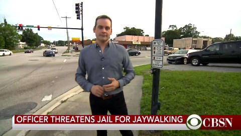 Officer threatens jail time for black teen in controversial jaywalking arrest