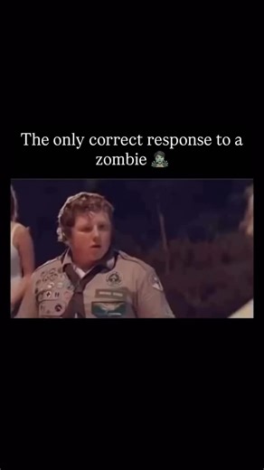 Daily Clip Breakdowns on Instagram: "The video, captioned “Me when the zombie apocalypse happens,” shows a group of people in scout uniforms confronting a screaming, bloodied zombie. As the zombie lunges, the terrifying audio is suddenly replaced by the opening vocals of Britney Spears’ “...Baby One More Time.” The zombie and the scouts immediately begin to lip-sync and perform the song in the middle of the road. Context/Analysis: The humor comes from the extreme pattern interrupt, replacing a t