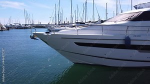 luxury yacht moored in a marina
