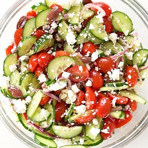 This traditional Greek salad recipe is one of my favorites. Simple yet flavorful, this 10-minute salad recipe goes great with so many dishes. Add this MUST TRY recipe to your menu this week. Printable Recipe: https://www.wholesomeyum.com/greek-salad-recipe/ | Wholesome Yum - Easy Healthy Recipes