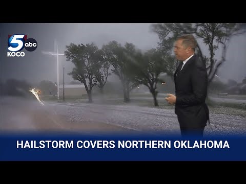 WATCH: KOCO 5 Meteorologist Michael Armstrong shows off massive hail in northern Oklahoma