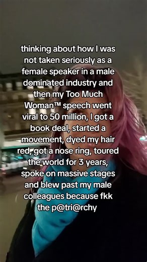 Gina Hatzis 💋 Too Much Woman on Instagram: "I wasn’t taken seriously in a male-dominated industry. So I built something they couldn’t ignore. Over 50 million views. A movement. A book deal. Red hair. Nose ring. World stages. Not because I wanted to beat men at their own game. But because the game itself is breaking. This isn’t about women climbing ladders inside crumbling systems. It’s about the system cracking open. The matriarchy isn’t a revenge fantasy. It’s a reclamation. It’s women remembe