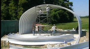 Time lapse video for the construction of a SteelMaster prefabricated arch style steel building showing step-by-step footage of the steel building's construction. A 35' width x 18' height x 40' length metal storage building was selected for the application of general farm storage. The completion time for this SteelMaster building's construction was just 3 days! The video was filmed in Knotts Island, NC in September 2010. | SteelMaster Buildings