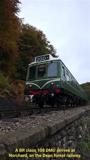 A BR class 108 DMU arrives at Norchard, on the Dean forest railway.