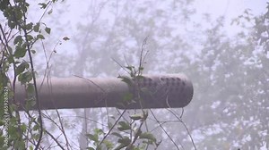 Close-up shot from the muzzle of a tank. A projectile flies out of the muzzle, the smoke dissipates, and the muzzle descends. Fighting in Ukraine. Russia-Ukraine War 2022-2023