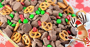 Reindeer Chow - Crispy Chex coated in Chocolate and Peanut Butter then coated with Brownie Mix.
