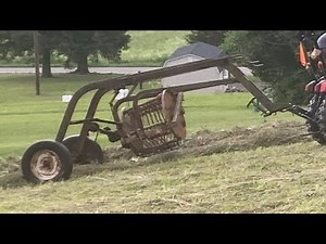 Raking hay with an IH no. 15 hay rake