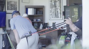 A little assistance goes a long way to learning the drill. | Bushnell Golf | Facebook