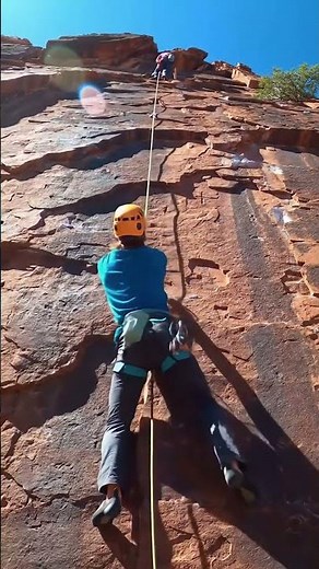 Incredible top-rope climb up a red rock wall. #rockclimbing