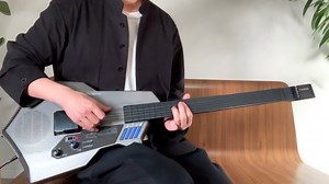 Musician Showcases His Talent on a Complex Casio Digital Guitar With Onboard MIDI Synthesizer