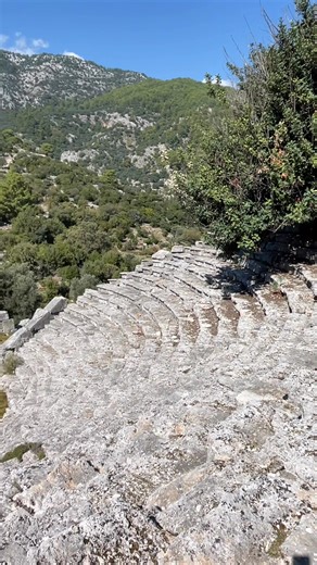 The best seat in ancient Lycia 🎭 From the top of Pinara’s ancient theatre, the stage is the landscape itself. The theatre of Pinara, set on the southern slope of the acropolis hill, takes advantage of the natural incline, offering commanding views over the plain beyond. It is one of the best-preserved monuments at the site and a fine example of a Hellenistic theatre later adapted in the Roman period. | Following Hadrian