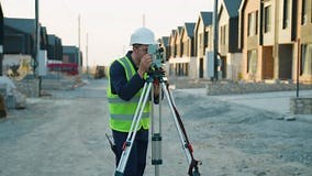 Surveyor Engineer Measuring Land on a Construction Site Stock Footage - Video of house, development: 411840384