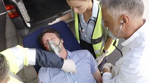Paramedic using an external defibrillator during cardiopulmonary resuscitation Free Stock Video Footage