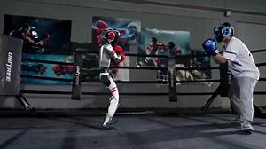 3.2K views · 20 reactions | Robot #Boxing Champion? In #UnitreeRobotics' latest video, their #robot model transforms into a formidable fighter. The company has announced it will begin livestreaming robot combat within the next month. #Unitree #HumanoidRobot #game | Shanghai Daily 上海日报 | Facebook