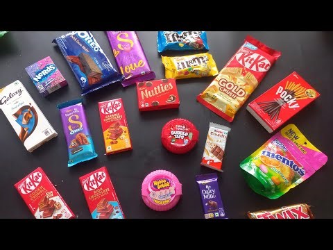 100 candies opening, chocolate a video, lots of chocolates, Cadbury celebration, surprise toys