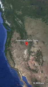 American Falls Dam spans the Snake River in southeastern Idaho, forming American Falls Reservoir across the wide Snake River Plain. Originally constructed in the early twentieth century and later rebuilt, the dam plays a central role in irrigation, flood control, and hydroelectric generation throughout the region. The surrounding landscape reflects volcanic history. The Snake River Plain was shaped by ancient lava flows and tectonic forces, creating fertile soils but limited natural rainfall. Sn