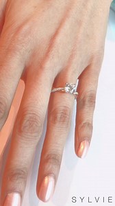 Say yes to this gorgeous #SpiralEngagementRing today! 💎 Find her the perfect #Sylvie style at sylviecollection.com! #EngagementRings #StackableBand #WeddingBand #Wedding #SheSaidYes | Sylvie Jewelry