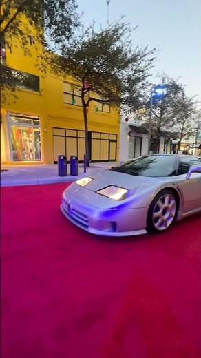 The legendary Bugatti EB110 Super Sport makes its entrance at the Miami Concours.